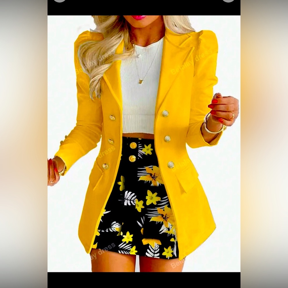 Very classy yellow blazer with black mini floral skirt for sale. Only one piece